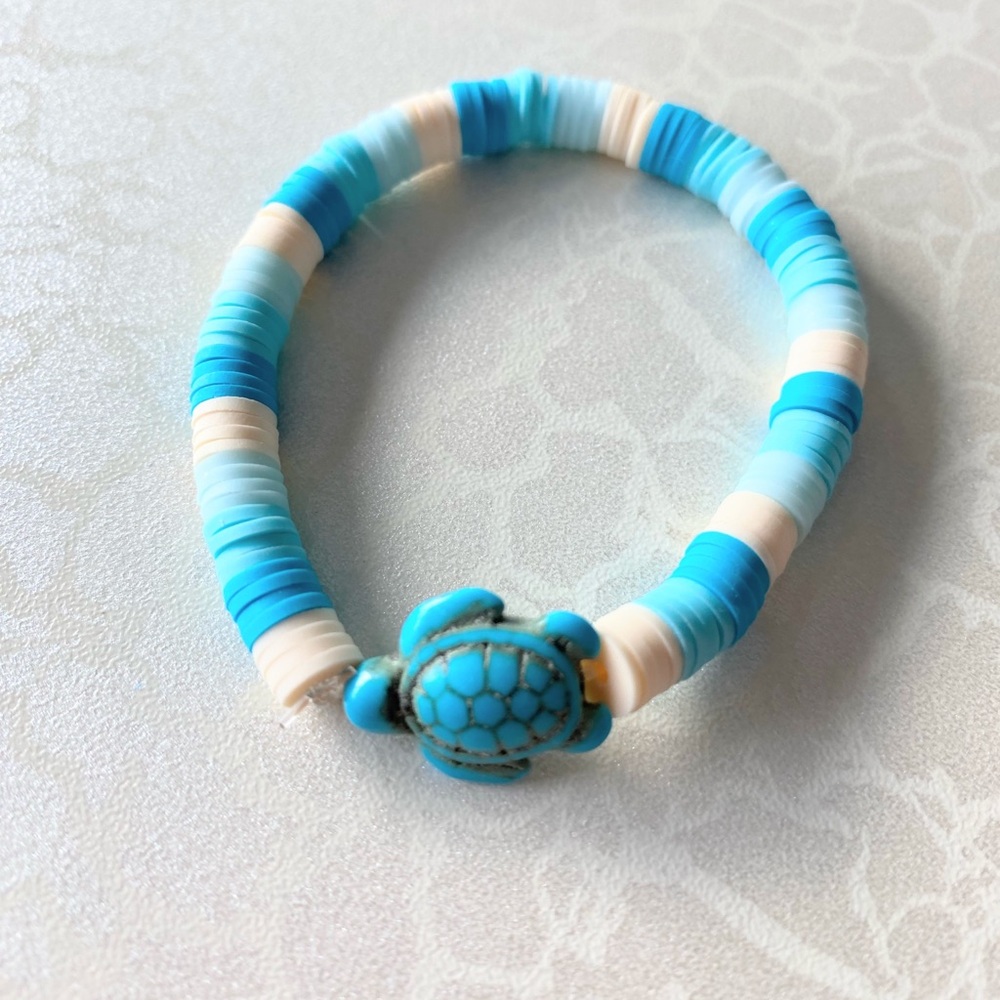 Blue and Cream Clay Heishi 
Beaded Bracelet with Turtle Charm
